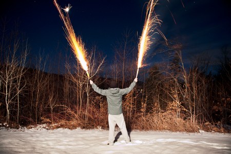 person holding fireworks in both hands