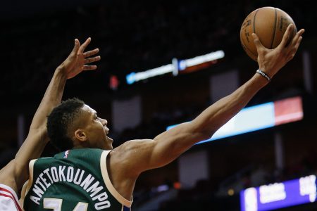 Giannis Antetokounmpo drives for a layup