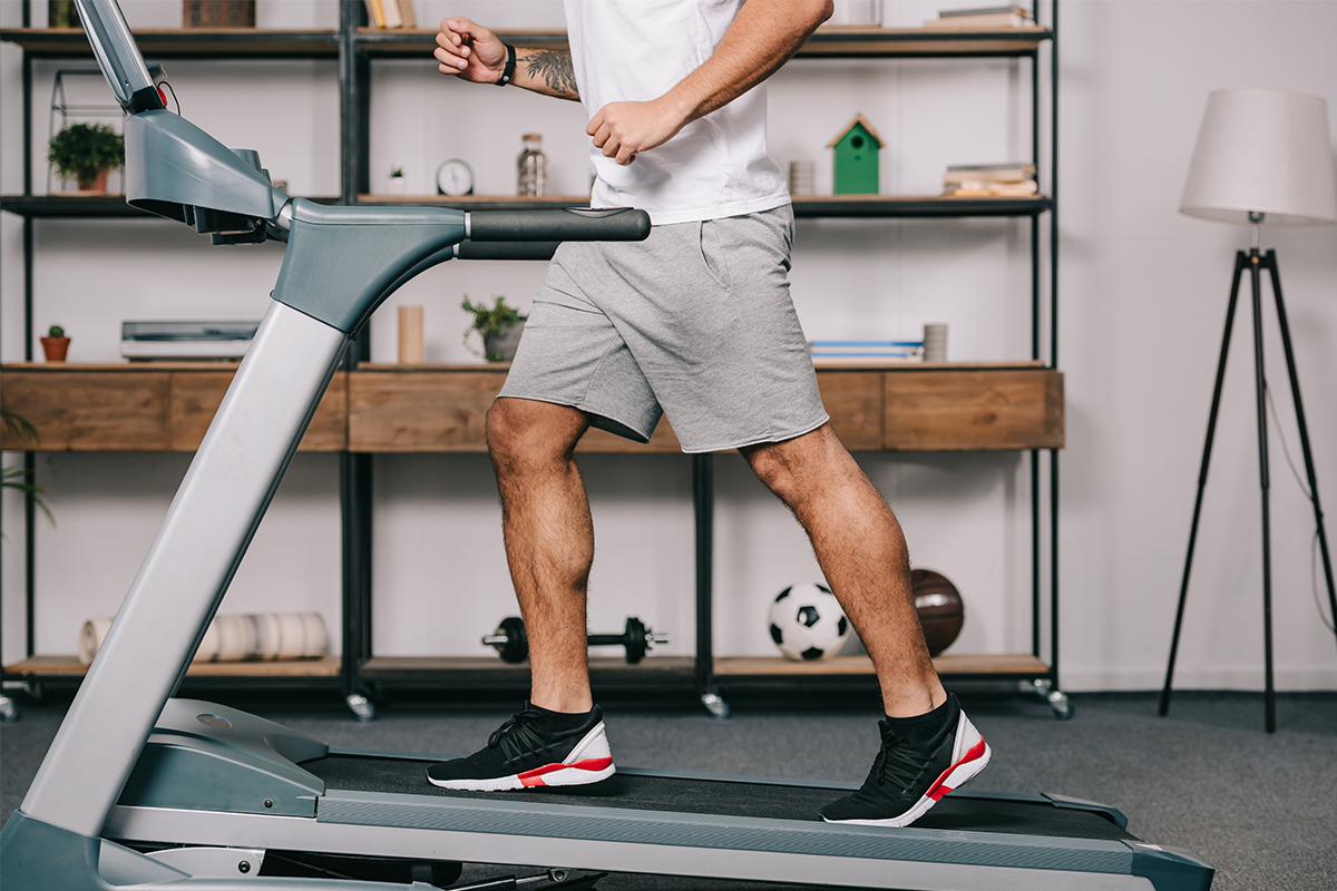 man walking on a treadmill