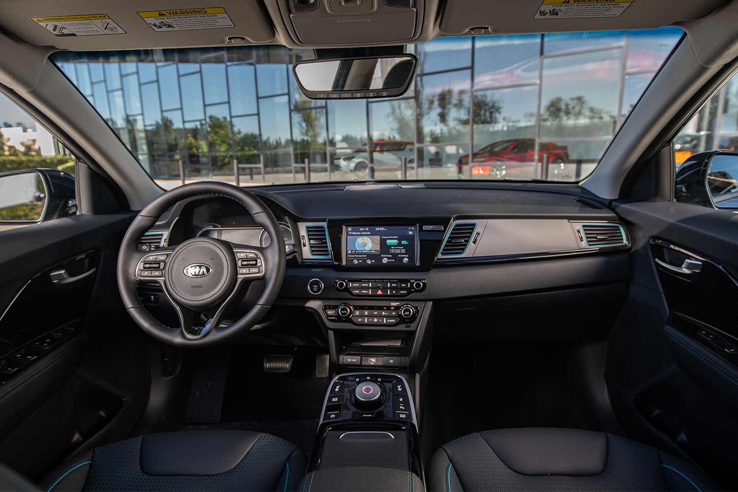 The view from the front seats of the Kia Niro EV, including the car's dashboard