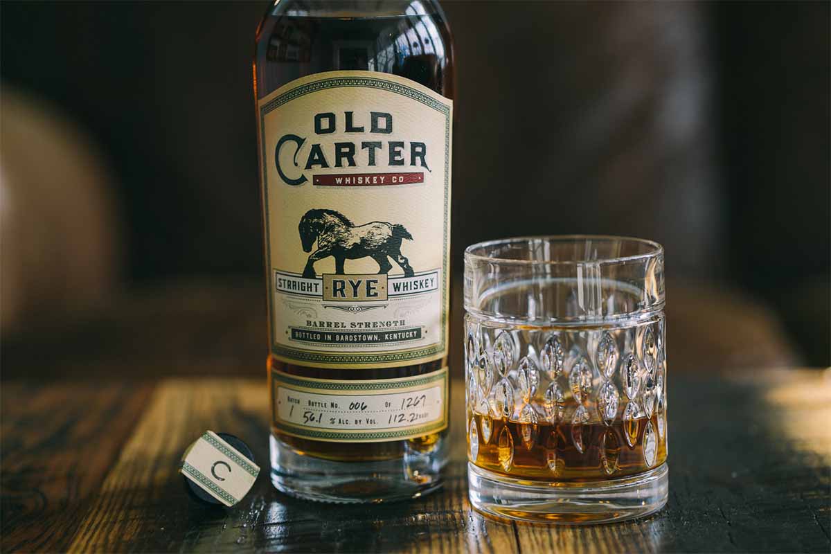 Old Carter rye in a glass and in a bottle