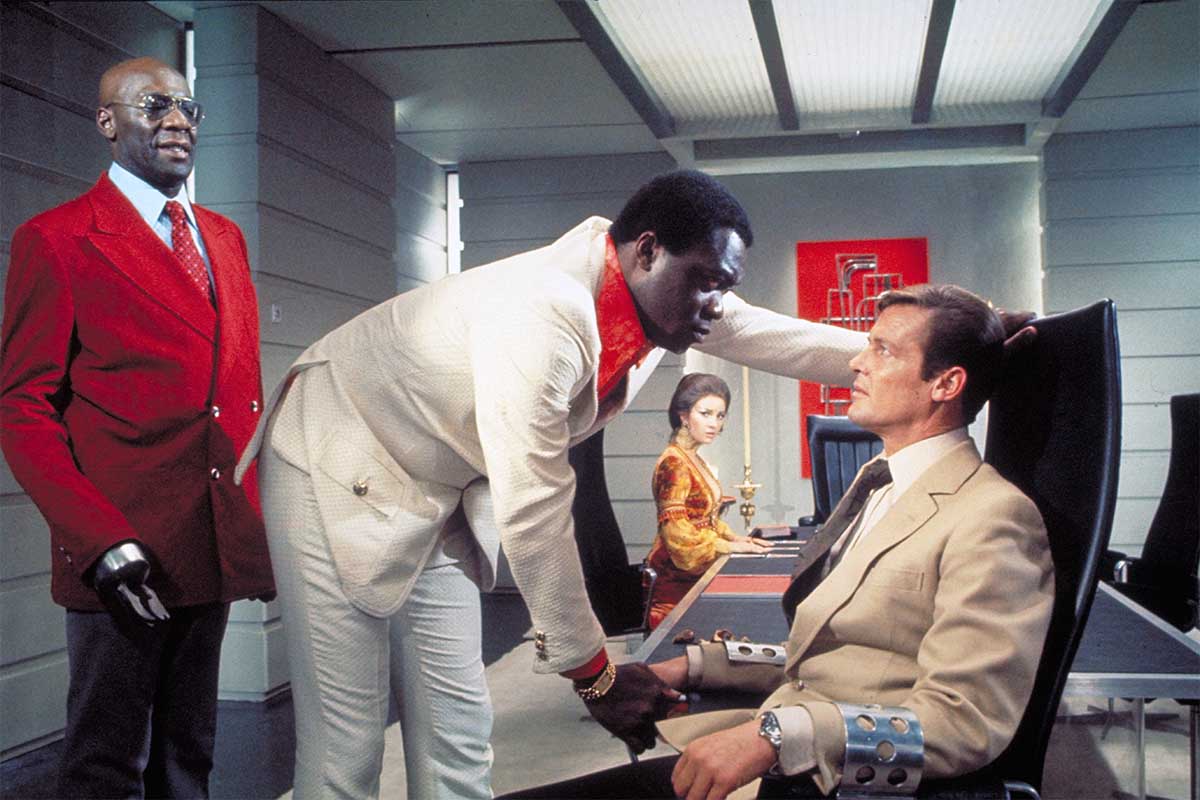 Actors Roger Moore, Yaphet Kotto, Julius W.Harris and actress Jane Seymour, on the set of "Live And Let Die".