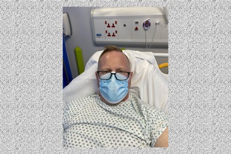 Jonathan Frostick in the hospital after suffering a heart attack