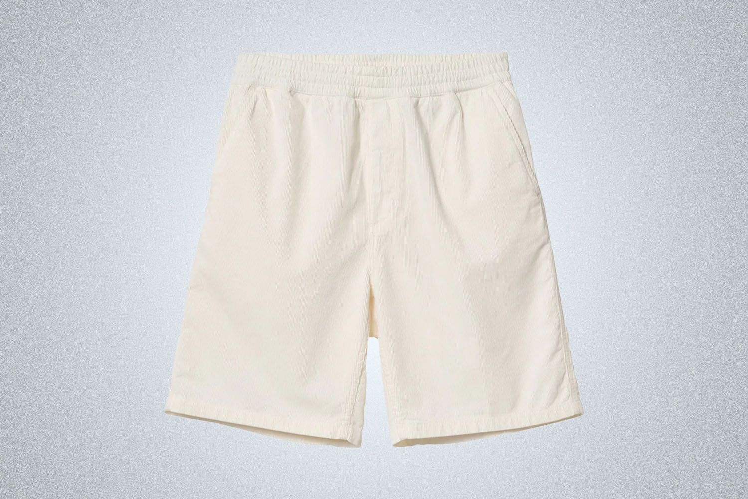a pair of white Carhartt WIP corduroy shorts on a grey background