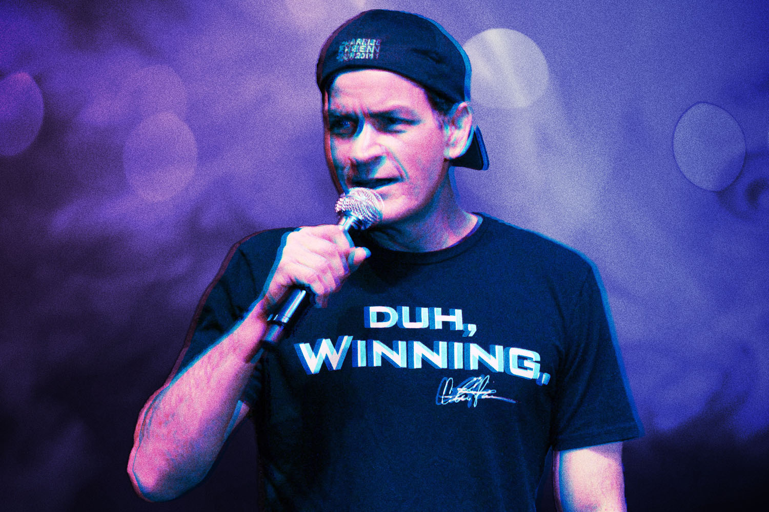 Charlie Sheen in his "Duh, winning" shirt during his ill-fated 2011 stage show/tour