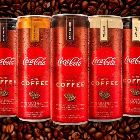 All five new cans of Coca-Cola With Coffee behind a coffee bean background