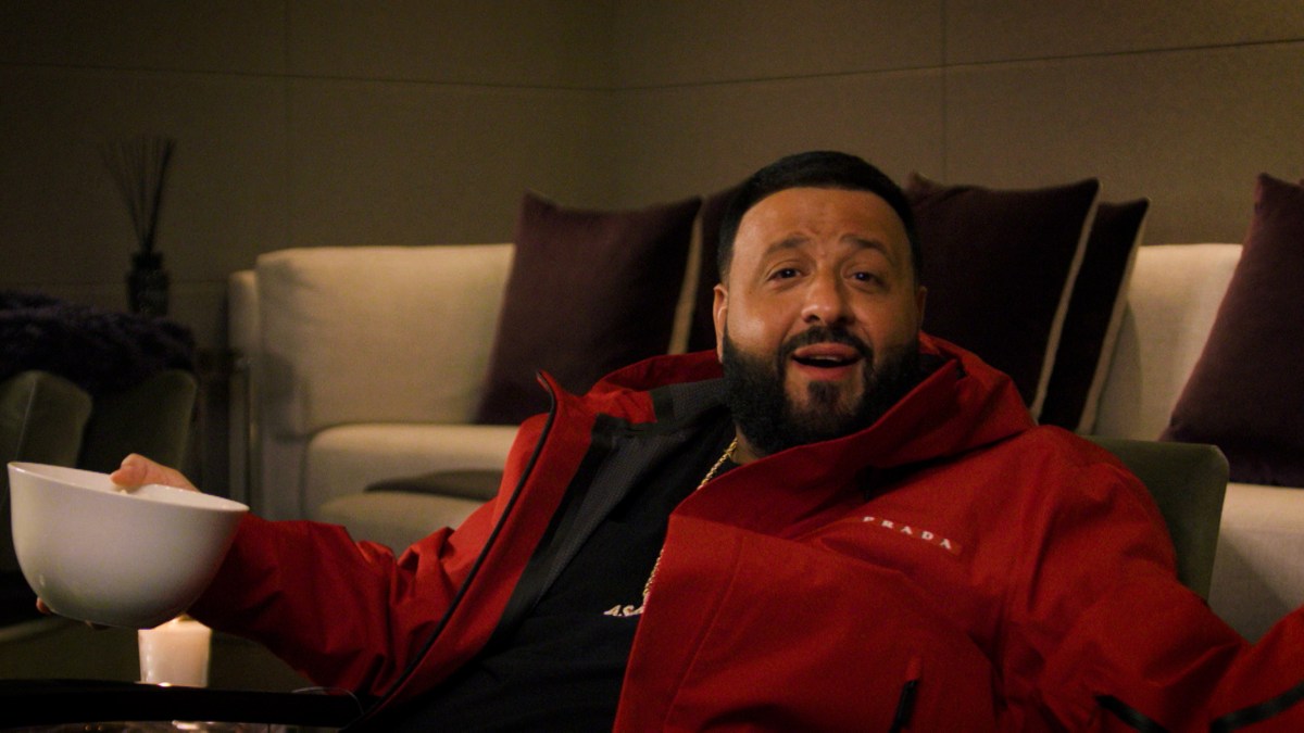 DJ Khaled relaxing on a couch