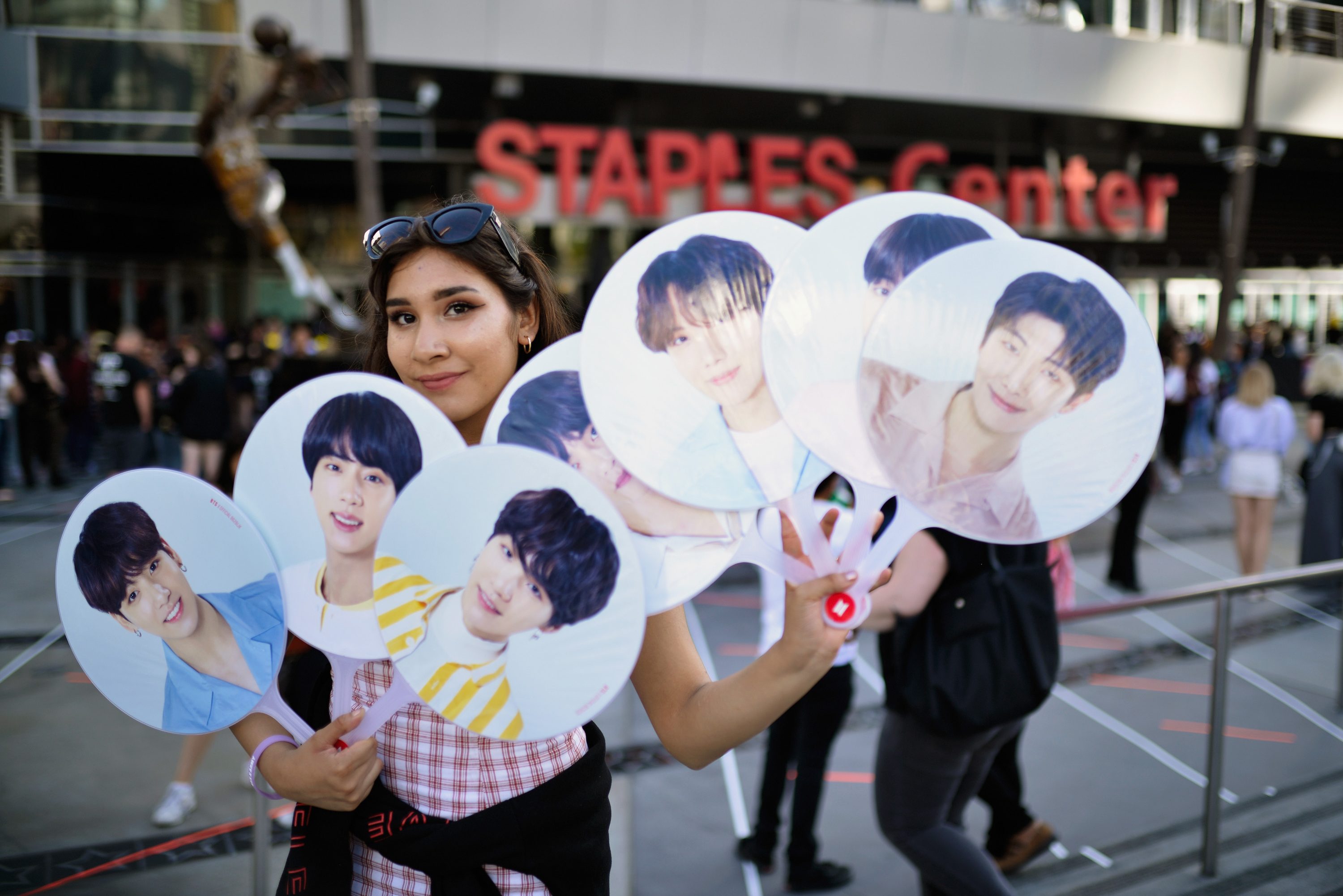 A fan awaits the BTS concert as part of the "Love Yourself" North American Tour at Staples Center on September 9, 2018 in Los Angeles, California.