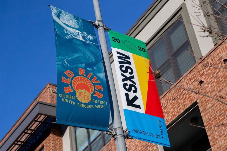 SXSW banners are seen in the Red River Cultural District on March 6, 2020