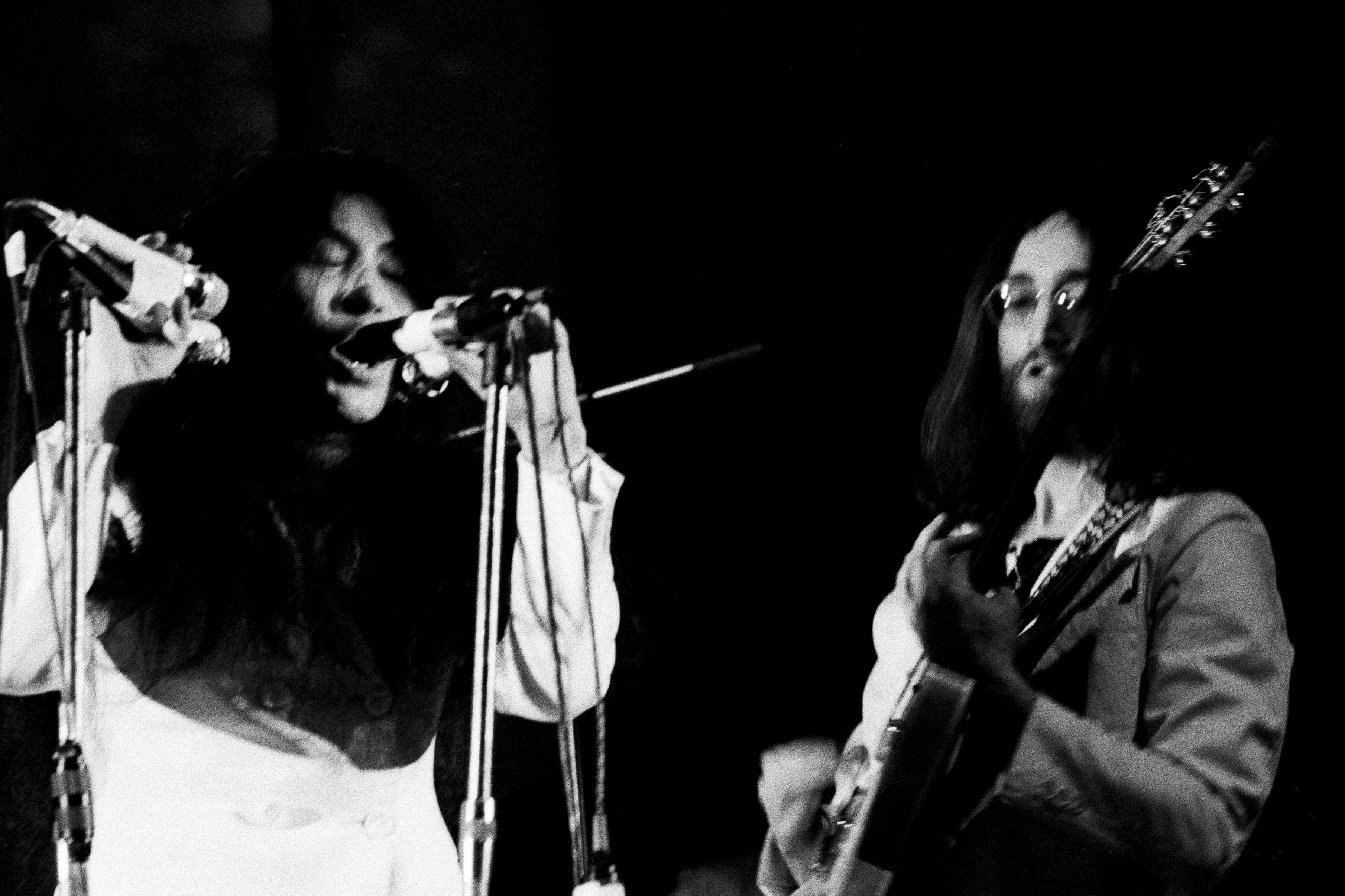Yoko Ono and John Lennon performing on stage with the Plastic Ono Band at UN Childrens Fund concert