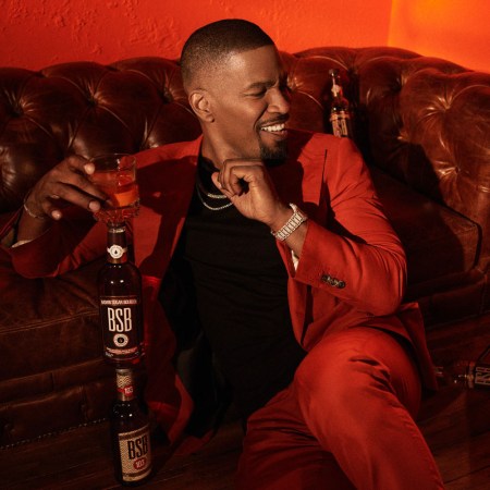 Jamie Foxx with a bottle of BSB-Brown Sugar Bourbon, the whiskey brand he just bought