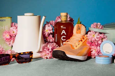 Mothers Day Gifts, clothing, cookware, beauty products laid out on a table