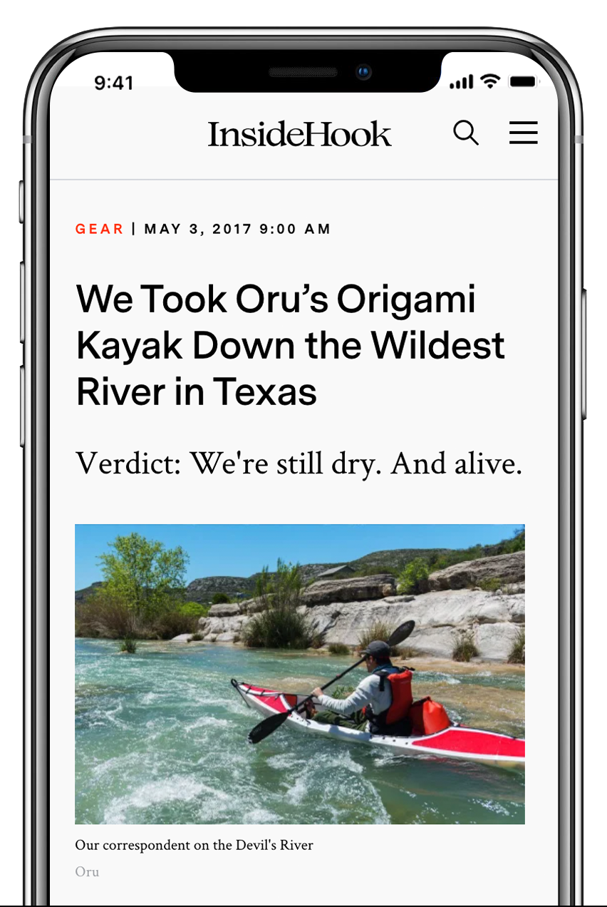 iphone with article about kayaking wild rivers in texas