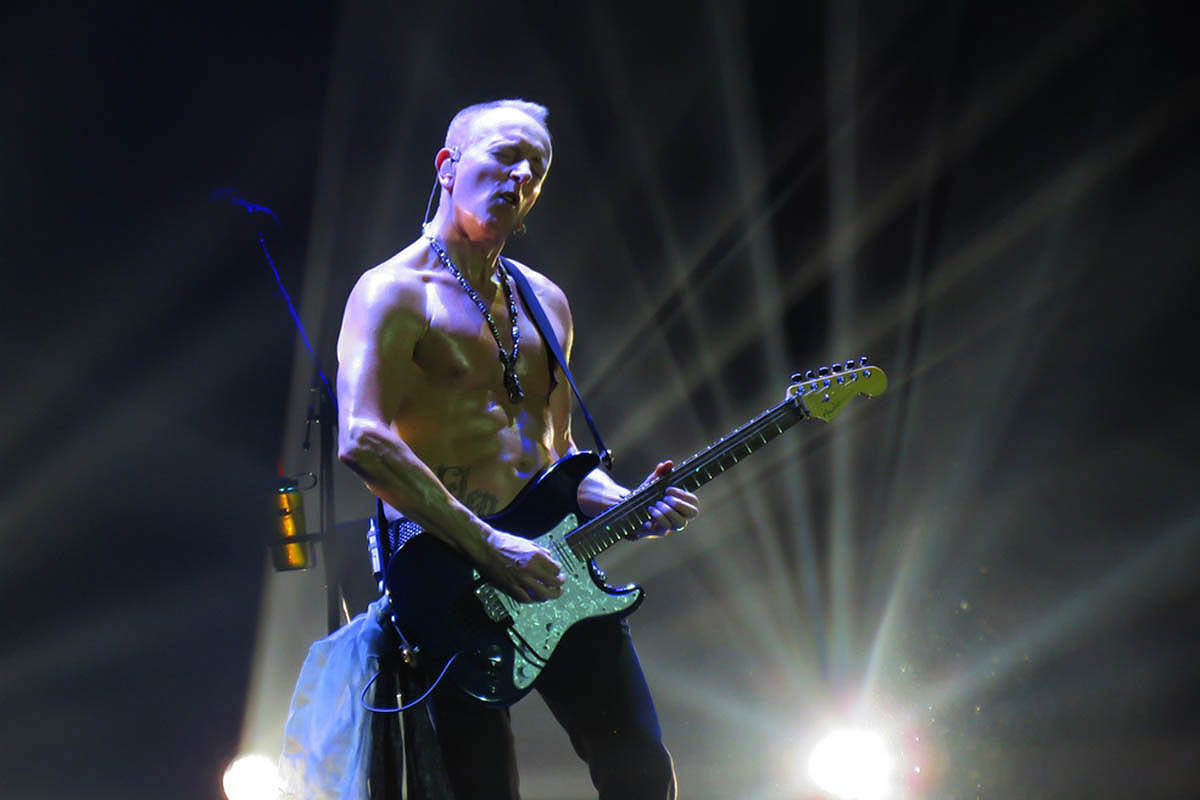 Phil Collen of Def Leppard performing in 2015
