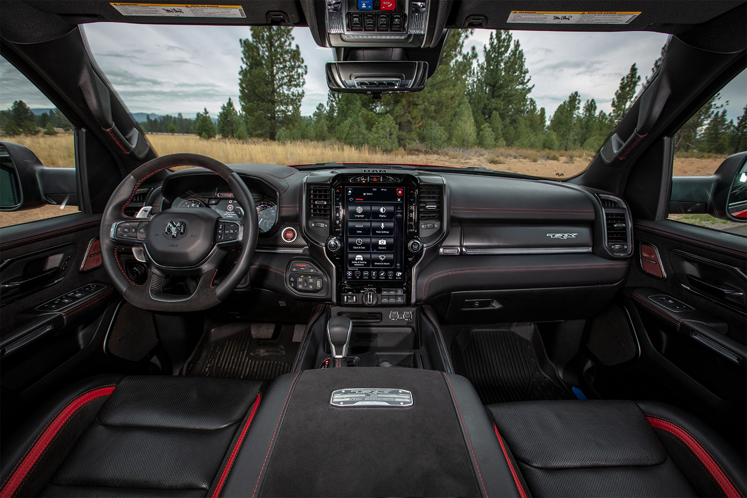 The front two seats in the interior of the 2021 Ram 1500 TRX pickup truck