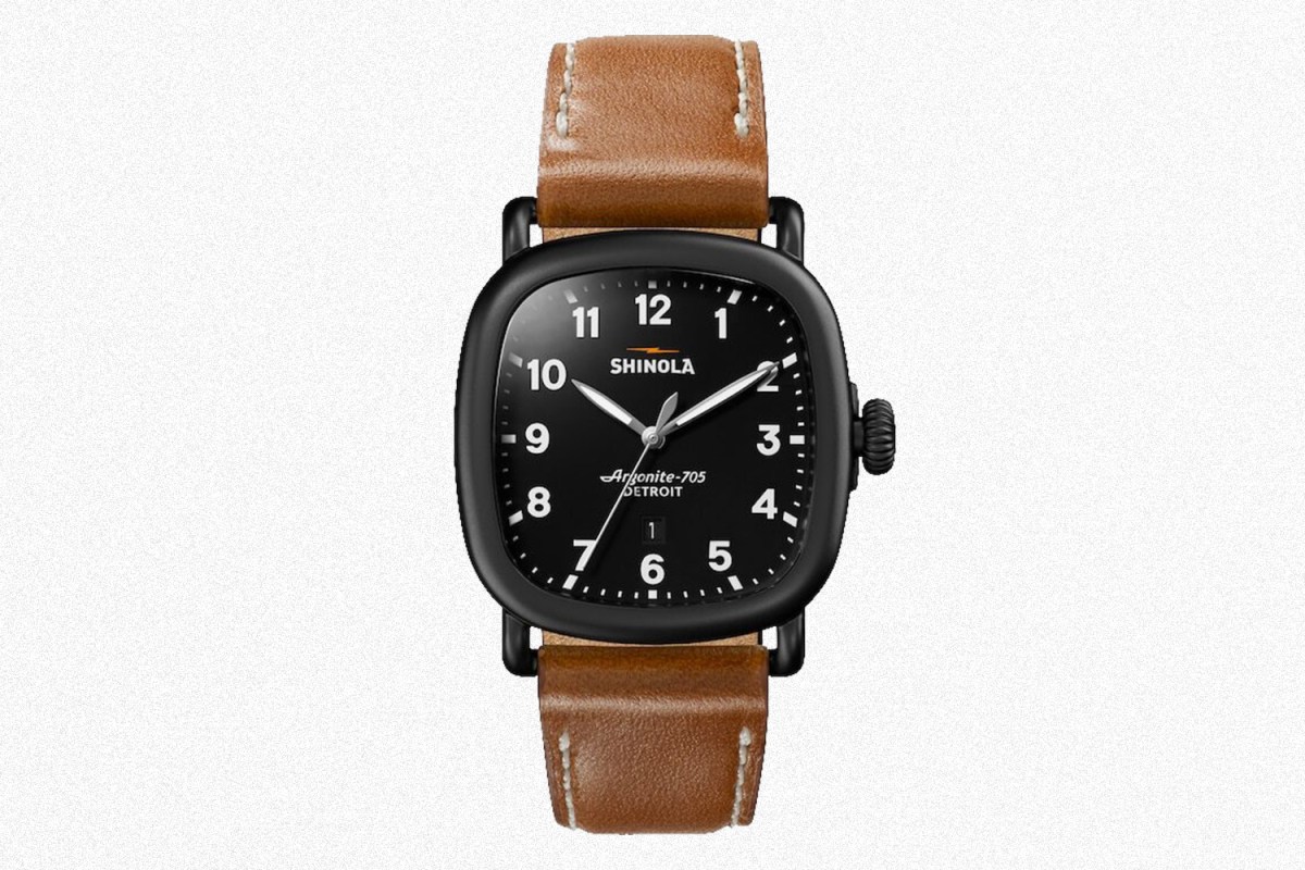 The men's Shinola Guardian watch with a black case and brown leather strap