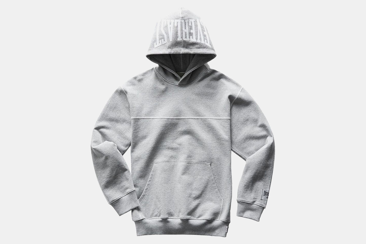 A hoodie from Reigning Champ and Everlast in grey on a white background
