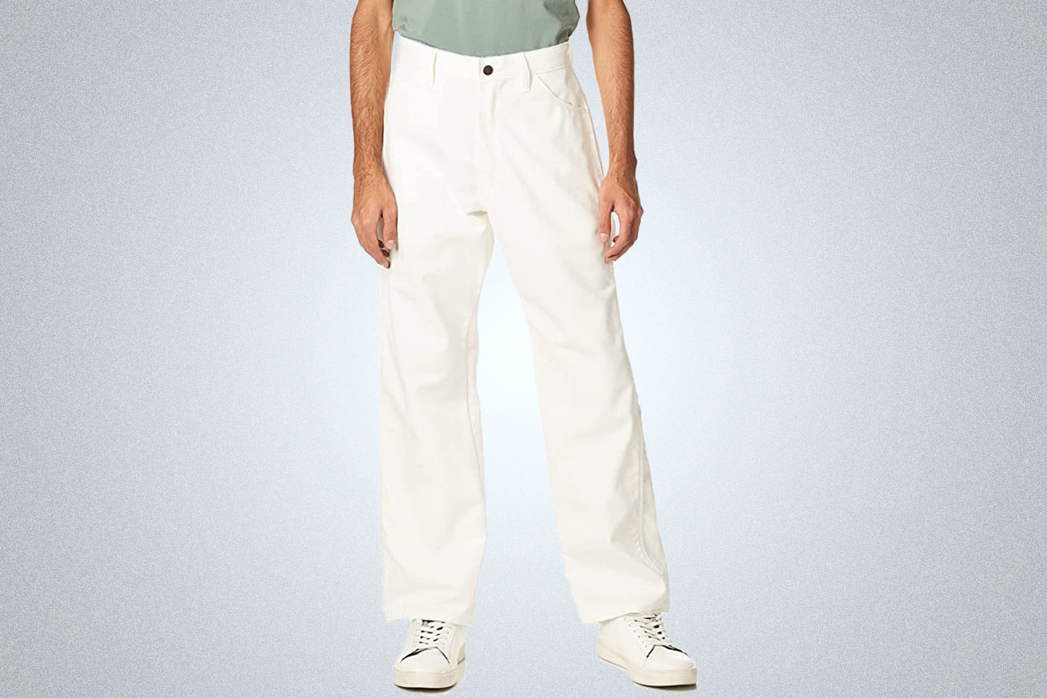 a pair of white pants on a model from Dickies on a grey background