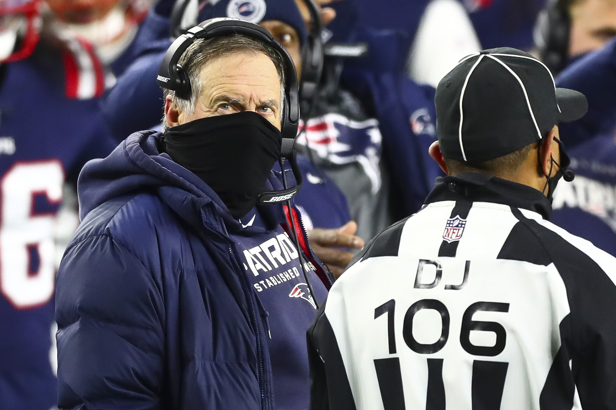 FOXBOROUGH, MA - DECEMBER 28: Head coach Bill Belichick of the New England Patriots talks to an official during a game against the Buffalo Bills at Gillette Stadium on December 28, 2020 in Foxborough, Massachusetts.