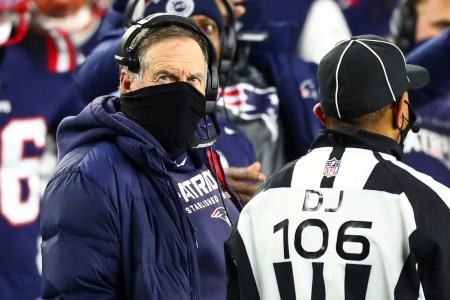 FOXBOROUGH, MA - DECEMBER 28: Head coach Bill Belichick of the New England Patriots talks to an official during a game against the Buffalo Bills at Gillette Stadium on December 28, 2020 in Foxborough, Massachusetts.