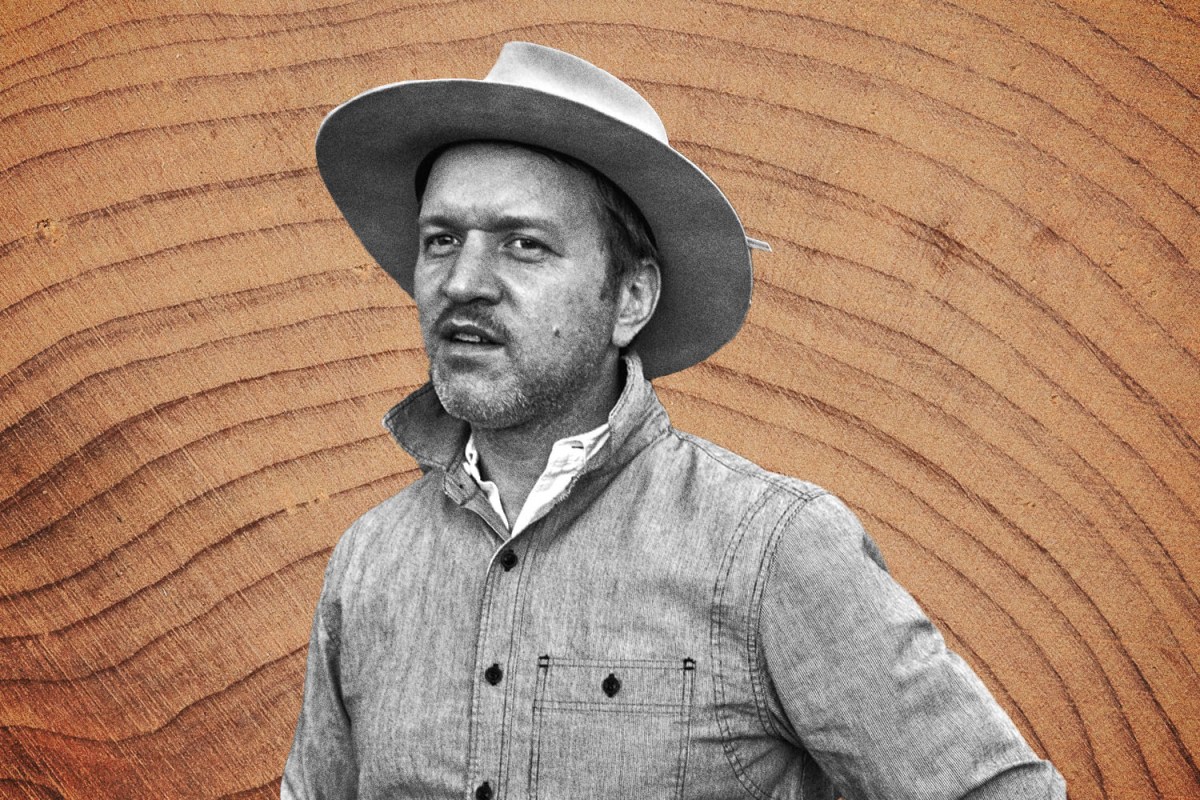 Best Made Co. founder Peter Buchanan-Smith in black and white on a wood grain background