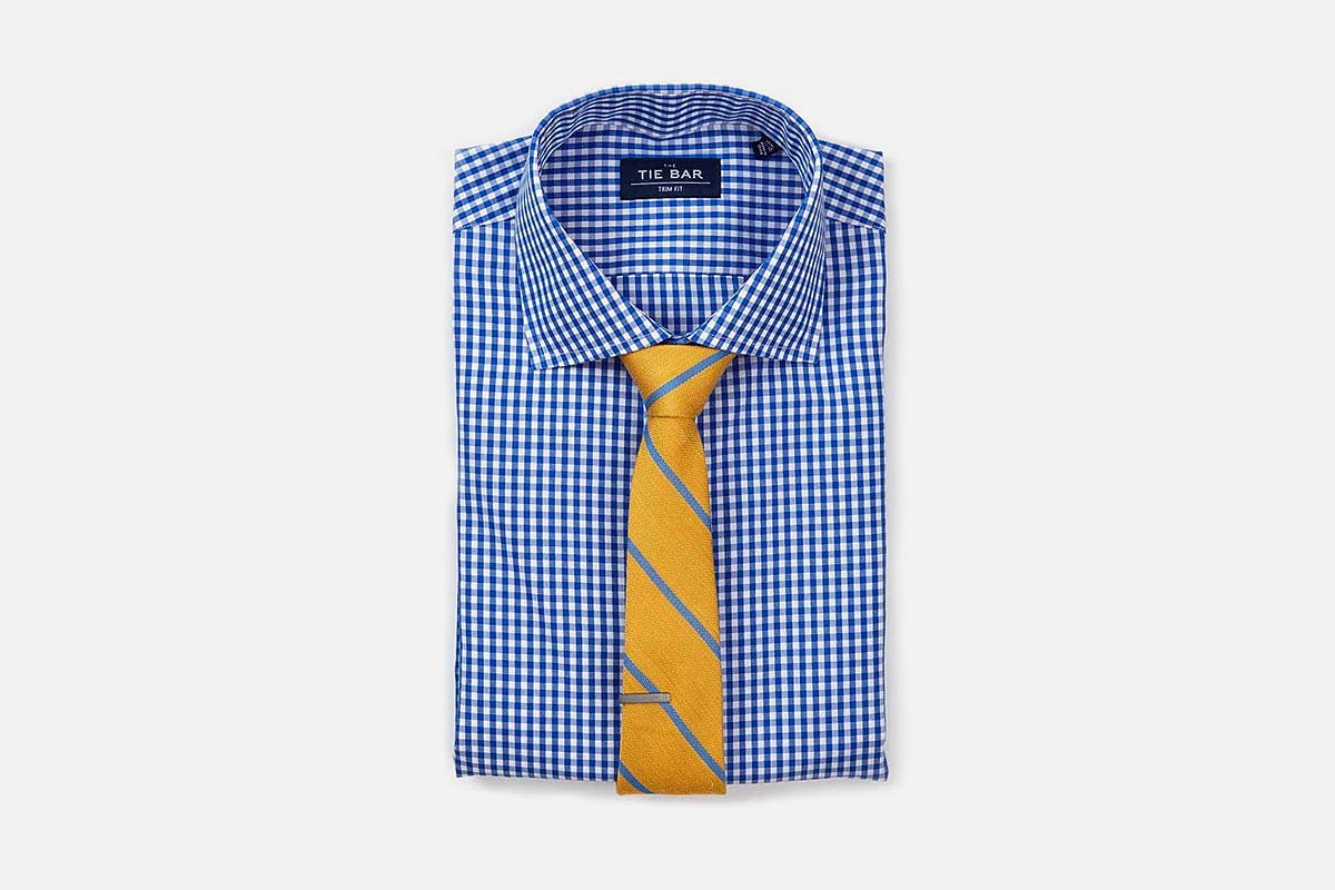 A dress shirt and tie from The Tie Bar, all up to 70% off during Memorial Day weekend
