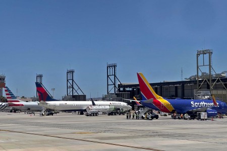 Southwest airlines (C) and Delta sirlines (R) aircrafts are seen at the San Jose del Cabo International Airport (SJD) in Baja California state, Mexico, on April 29, 2021