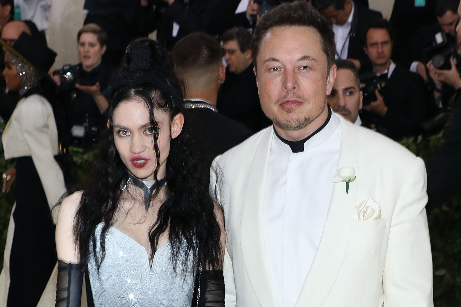Grimes and Elon Musk attend "Heavenly Bodies: Fashion & the Catholic Imagination", the 2018 Costume Institute Benefit at Metropolitan Museum of Art on May 7, 2018 in New York City