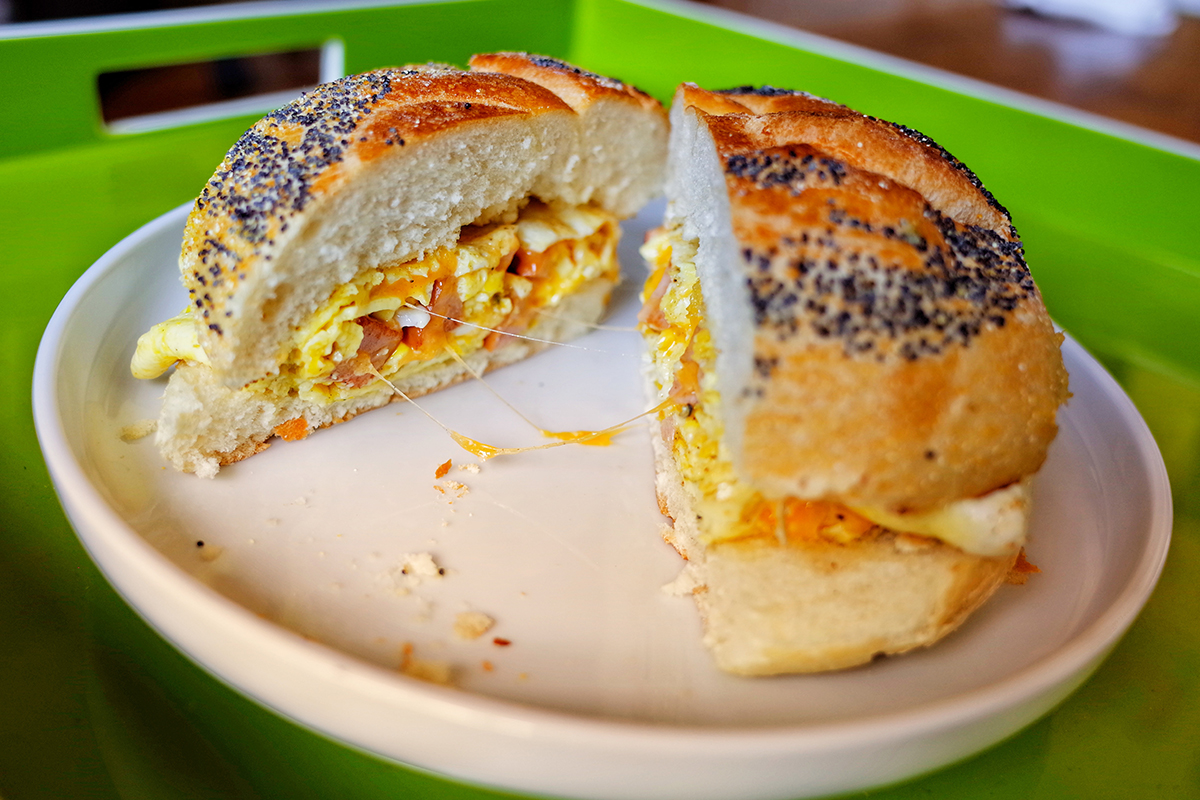 A breakfast sandwich on a plate in NYC