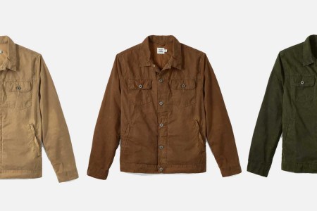 Flint and Tinder's Unlined Waxed Trucker Jacket in tan, brown and forest