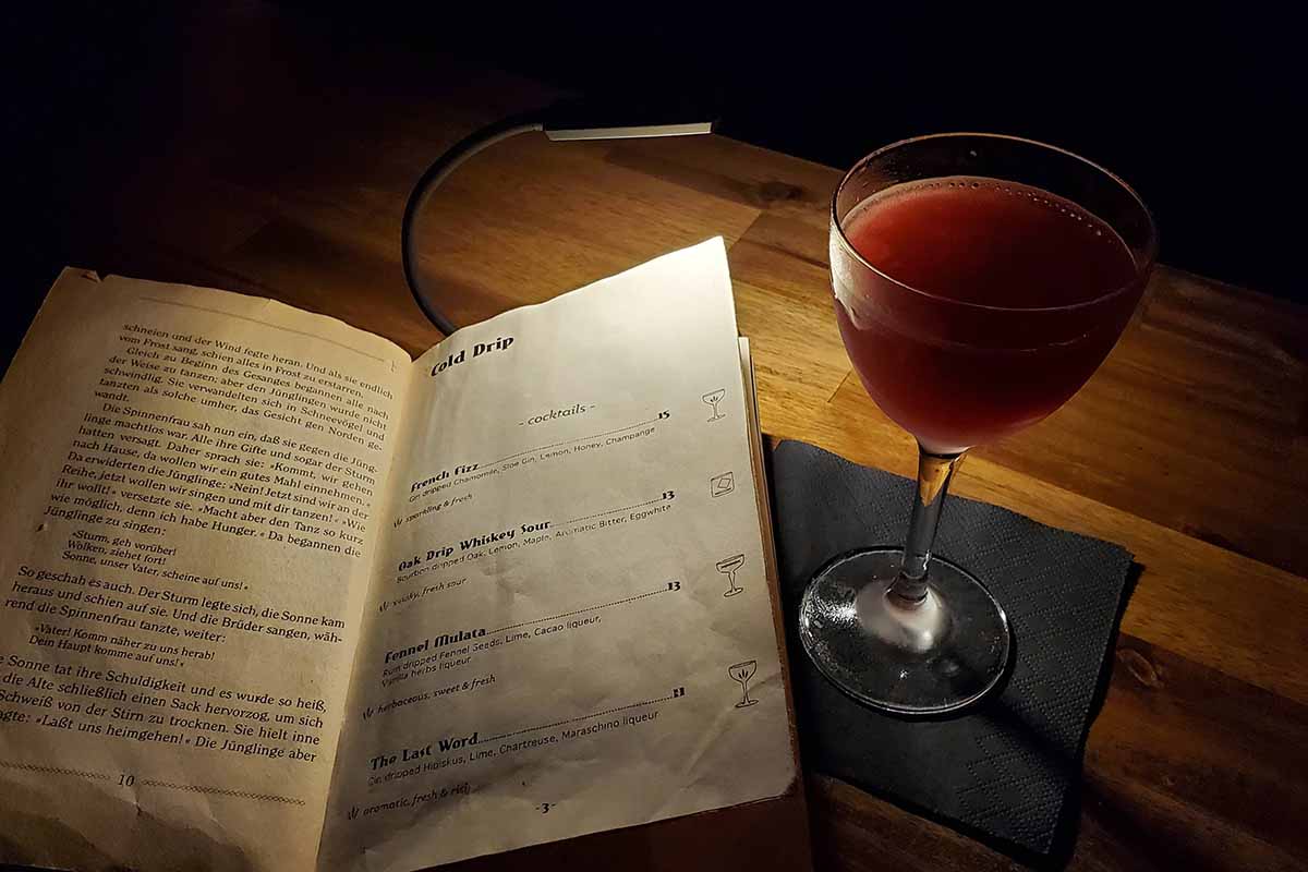 A drink menu and cocktail from Hamburg's Drip Bar, where they infuse cocktails via cold brew drippers