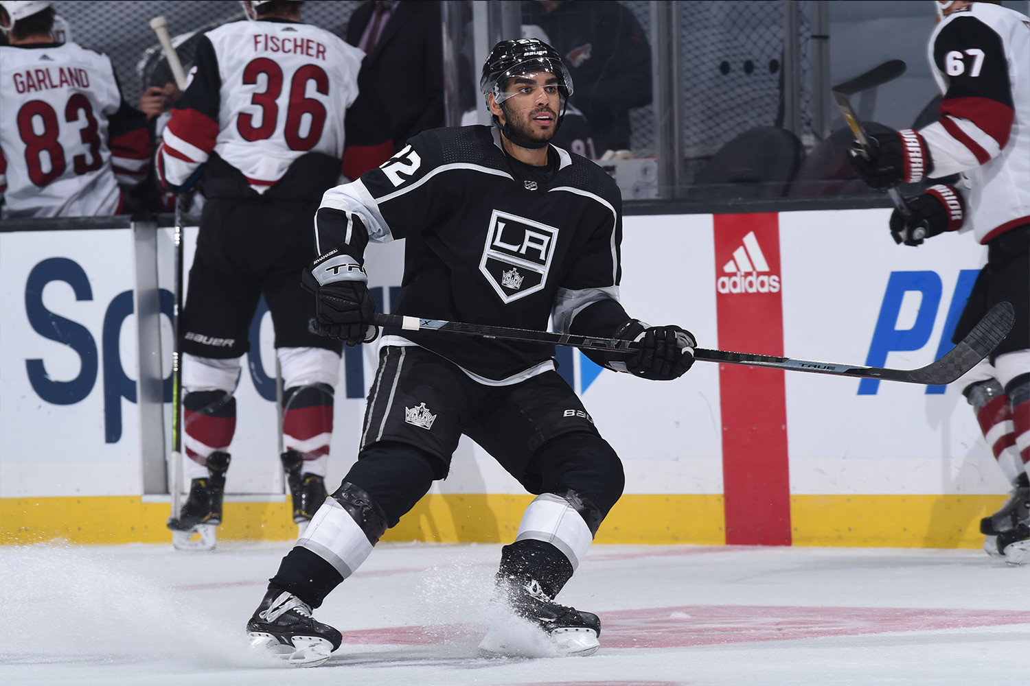 Andreas Athanasiou #22 of the Los Angeles Kings skates on the ice during the third period against the Arizona Coyotes at STAPLES Center on April 7, 2021