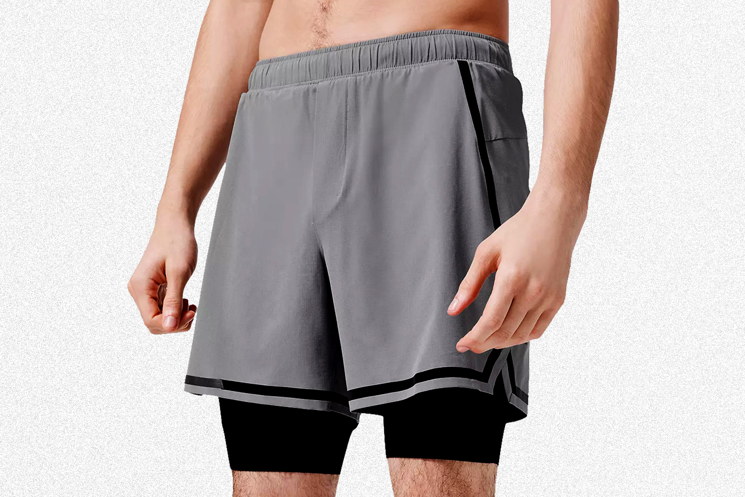 A man wearing Lululemon's Lined Surge Shorts