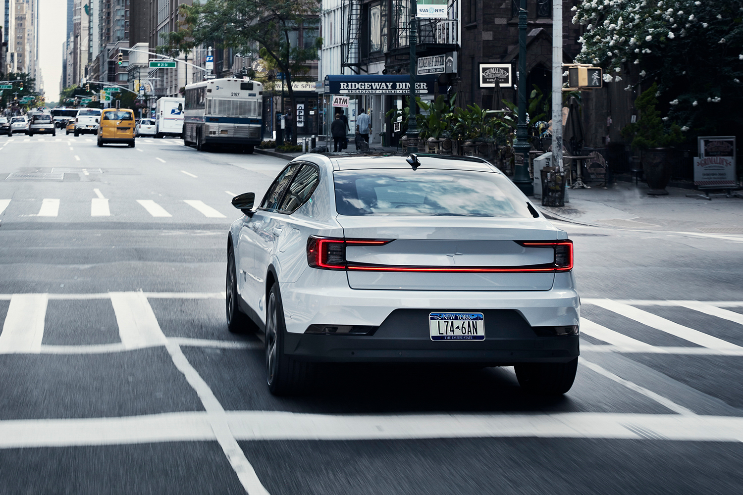 The 2021 Polestar 2 driving down the streets of New York City