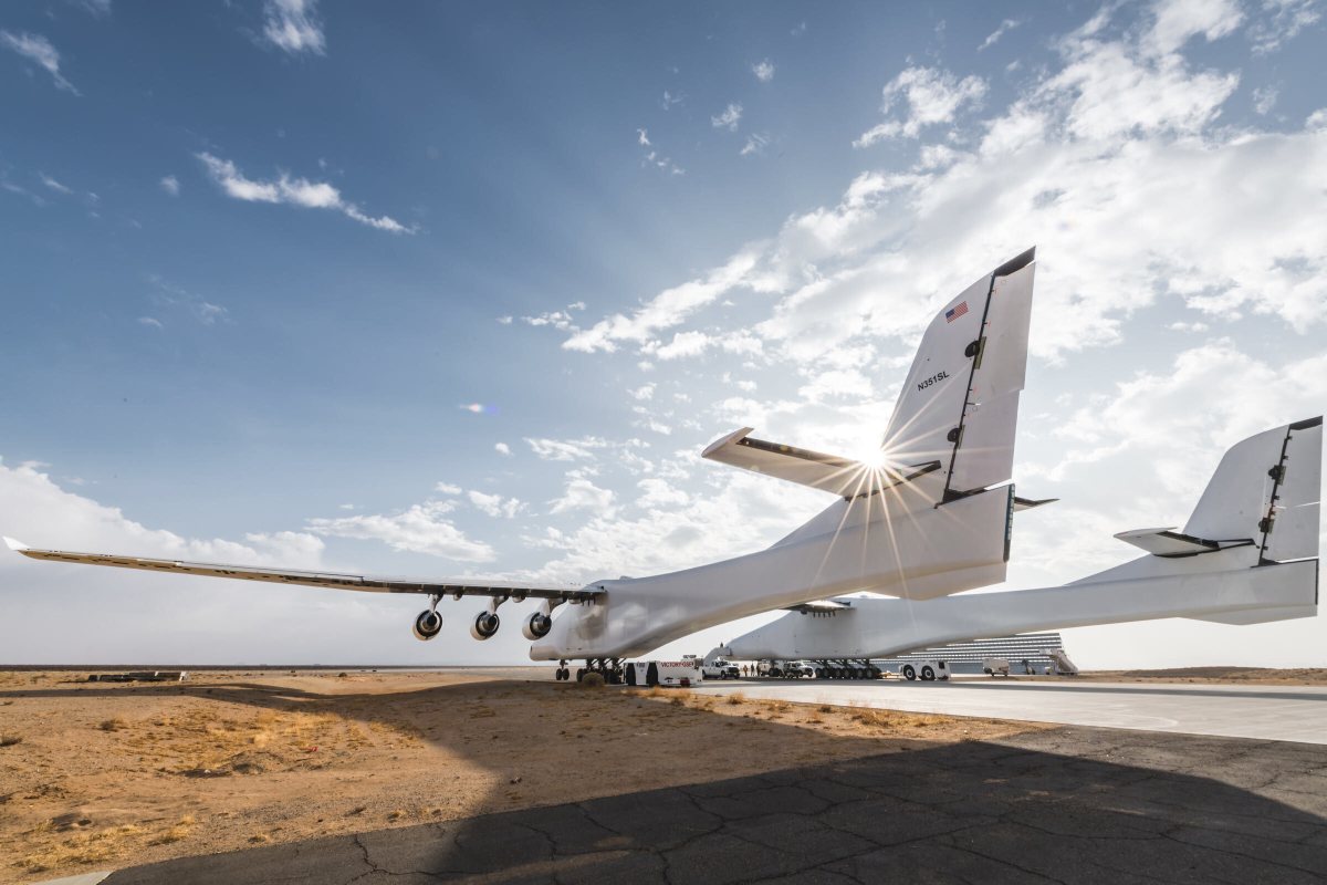 Stratolaunch's carrier aircraft called the Roc on a runway under a blue sky