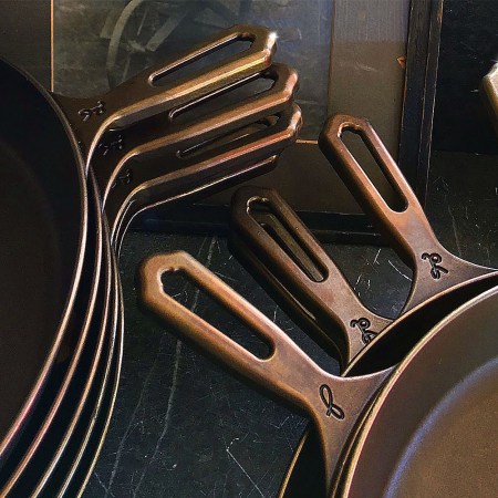 Cast-iron pans from Butter Pat stacked on top of each other