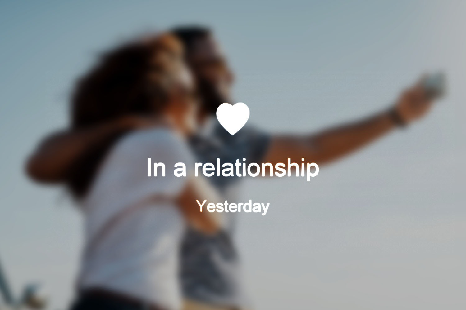 Blurred photo of a couple, text overlay reads "in a relationship"