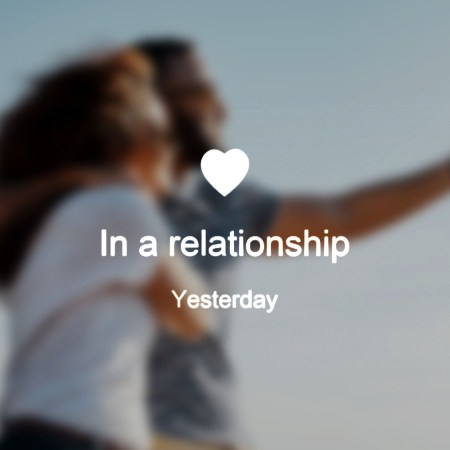 Blurred photo of a couple, text overlay reads "in a relationship"