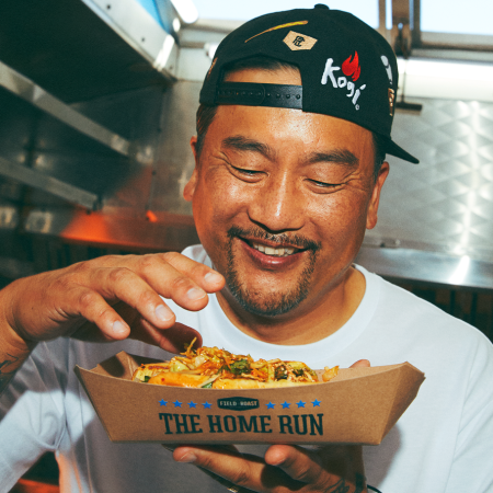 Roy Choi stares with glee at the Kogi Dog.