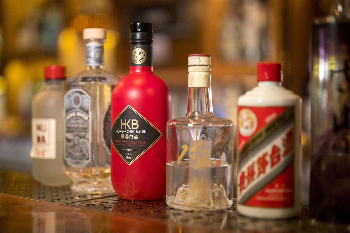 Bottles of Baijiu Chinese spirit are displayed at a bar in central London on May 15, 2019