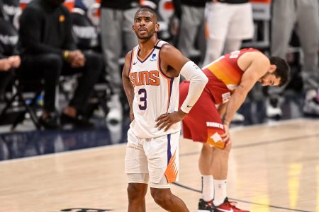 Chris Paul of the Phoenix Suns walks on the court.