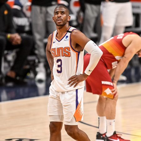 Chris Paul of the Phoenix Suns walks on the court.