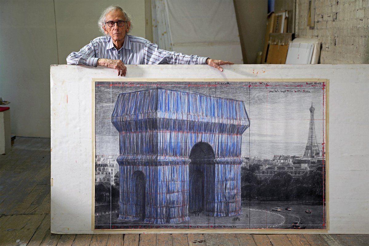 Artist Christo in his studio with a preparatory drawing for "L'Arc de Triomphe, Wrapped"