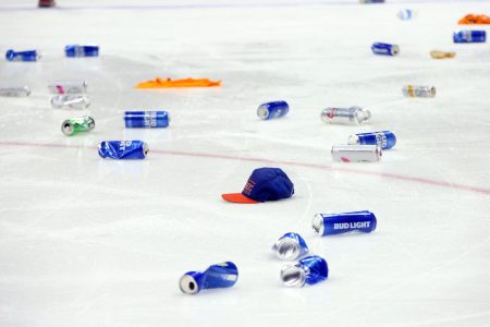 The ice at Nassau Coliseum covered in beer cans following the New York Islanders win on Wednesday night