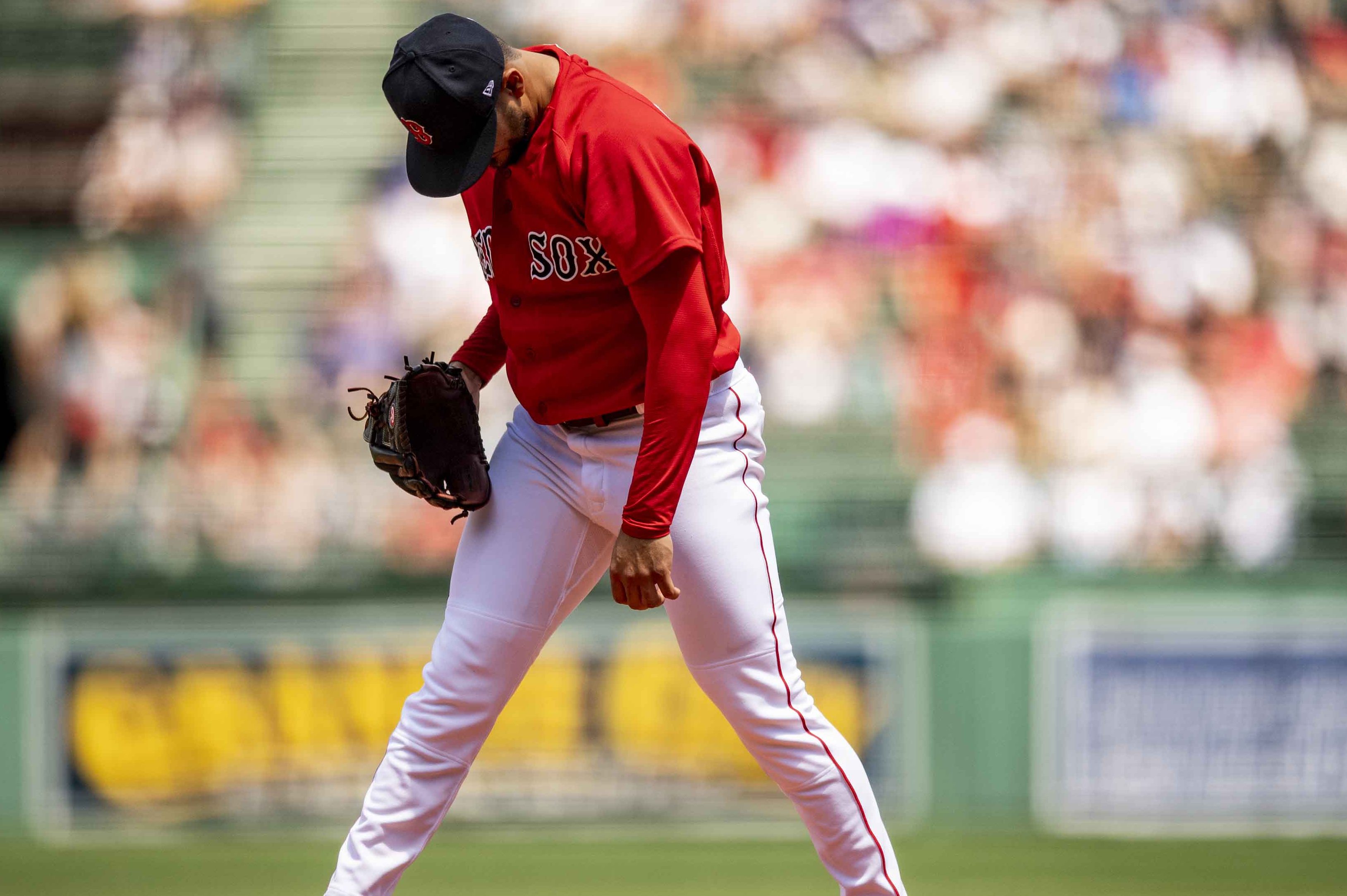 Martin Perez of the Red Sox reacts after allowing a home run.