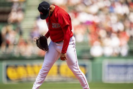 Martin Perez of the Red Sox reacts after allowing a home run. 