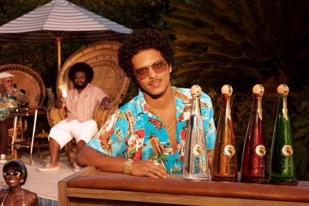 Bruno Mars at a bar with the four expressions of SelvaRey, the rum he co-owns