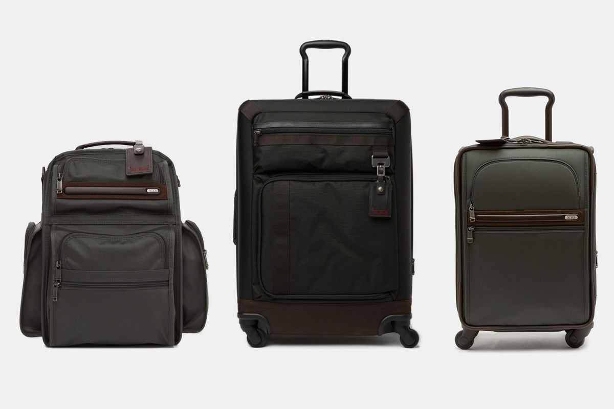 Three different Tumi travel bags, including suitcases and backpacks, which are currently on sale at Nordstrom Rack