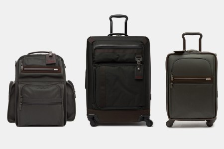 Three different Tumi travel bags, including suitcases and backpacks, which are currently on sale at Nordstrom Rack