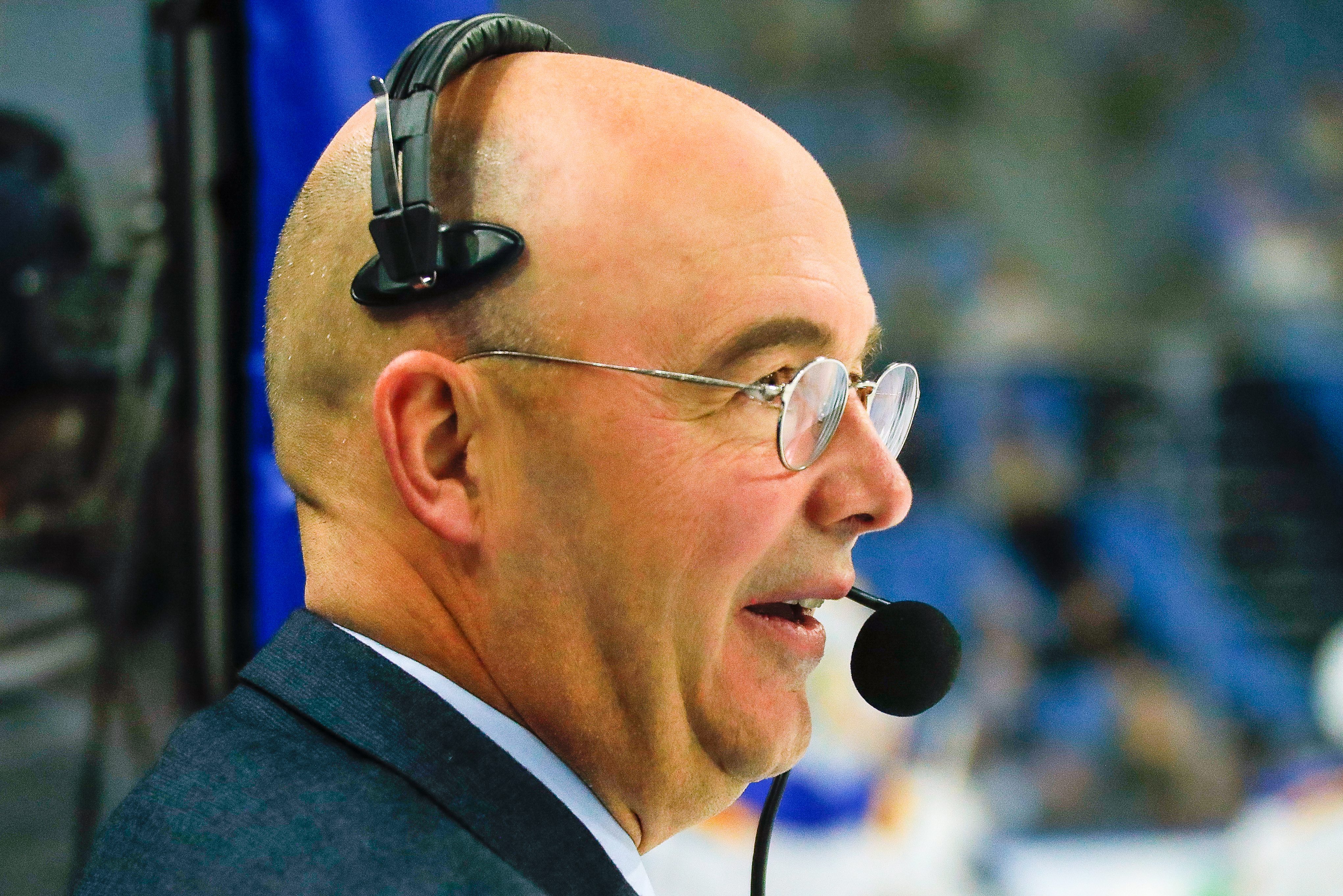 Hockey analyst Pierre McGuire wearing a mic. McGuire was recently appointed VP of player development for the Ottawa Senators.